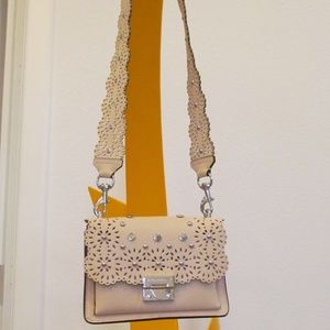 Rebecca Minkoff neutral bag with detachable strap.